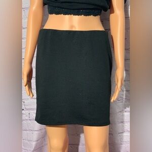 Women’s Black mini skirt. Stretchy and form fitting Brand: Doublju Size XL